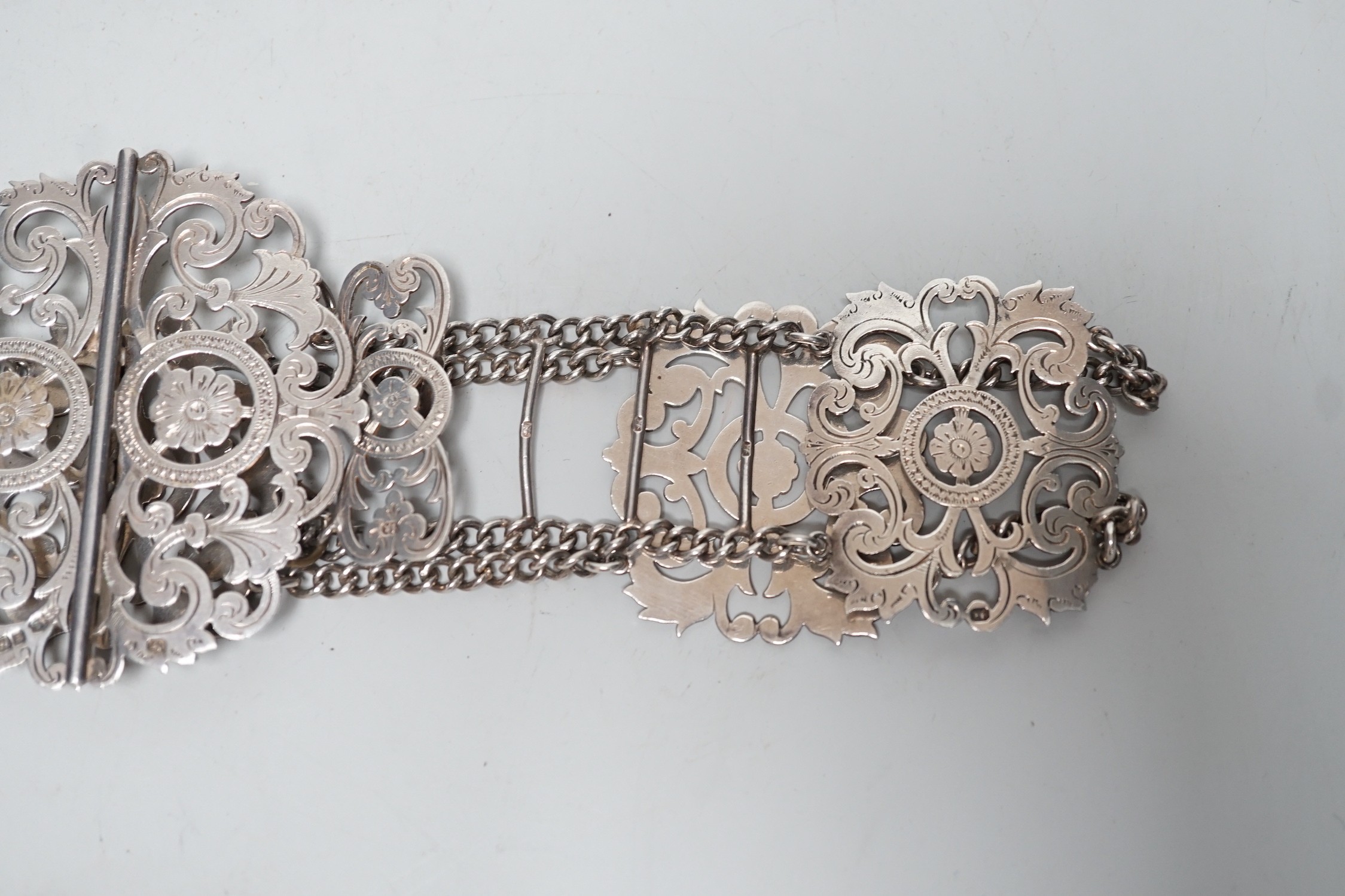 A late Victorian pierced silver belt, with chain links, James Dixon & Sons, Sheffield, 1898, overall 59.6cm.